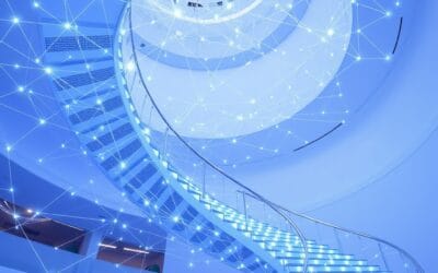 architecture distribuée brillante avec nœuds connectés en réseau bleu-blanc, escaliers de déploiement ascendants, code flottant en spirale, boussole d&rsquo;infrastructure, cinematic editorial, no text no letters no words no writing no signs no labels no watermarks no logos no typography no numbers on surfaces