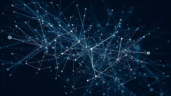 Cinematic editorial illustration of multimodal AI systems processing diverse data types, dark navy and blue palette, abstract interconnected neural networks representing vision audio text integration, no text no letters no words no writing no signs no labels no watermarks no logos no typography no numbers on surfaces