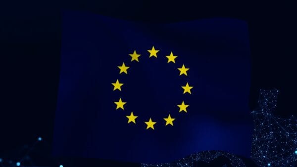 Cinematic editorial illustration of European digital sovereignty and AI innovation, dark navy and blue palette, abstract EU flag symbolism with technology networks and collaborative ecosystems, no text no letters no words no writing no signs no labels no watermarks no logos no typography no numbers on surfaces